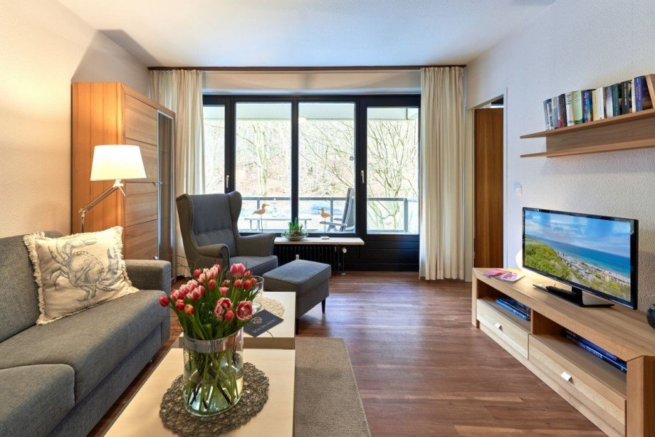 Wohnzimmer mit Zugang zum Balkon Etagenwohnung Timmendorfer Strand