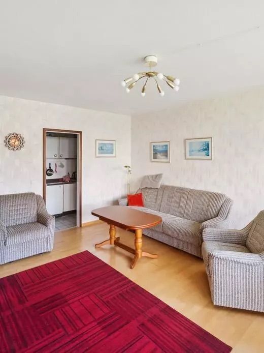 Wohnzimmer Zugang zur K�chenzeile Erdgeschosswohnung Scharbeutz